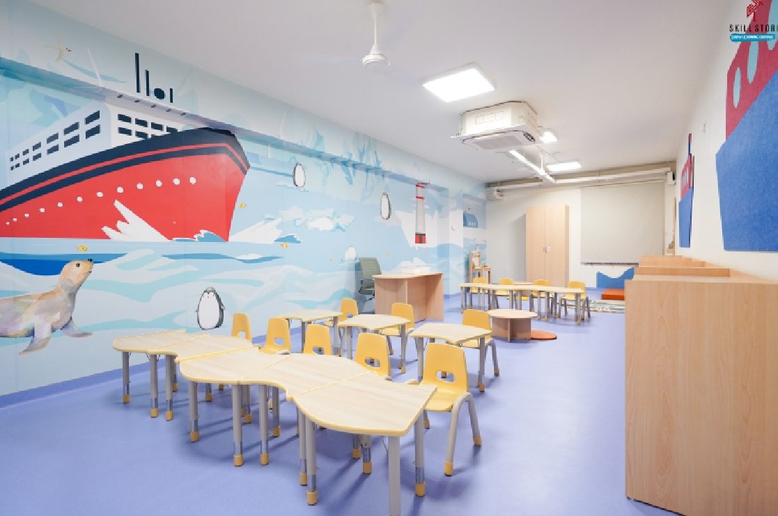 A themed classroom with an ocean mural at Skill Stork ELC