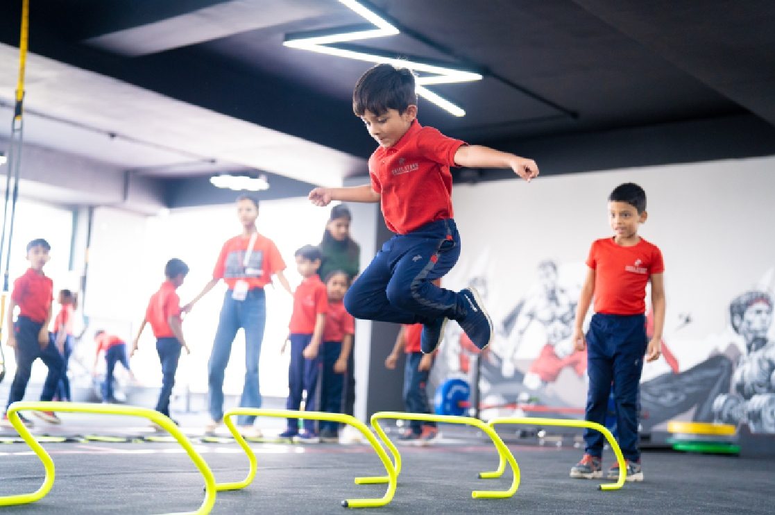 A child completing a movement activity at Skill Stork ELC