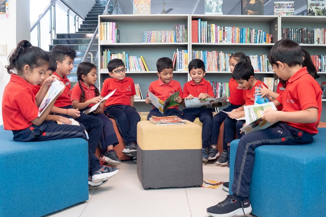 Children reading together at Skill Stork ELC